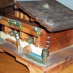 Vintage Swiss Chalet Wooden Music Box.  Music Box works perfect when lid is lifted.  Measures 6"l x 4"w x 4"h.  Pre-owned & in good vintage condition.  $30.00 obo