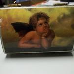 Angel Lacquered Trinket Box.  Beautiful Angel on front.  Measures 5.5"l x 4"w x 2.5"h.  Pre-owned & in excellent condition.  $13.00 obo
