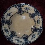 Antique William A. Adderley (WAA), England Flow Blue China Bowl.  Malta pattern, shallow bowl w/raised scrolls along scalloped gold rim.  Measures 9 1/2" in diameter x 1" deep.  Believe to be from late 1800's.  Pre-owned & in good condition, small ship on back & crackling throughout.  $25.00 obo