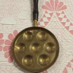 Antique Brass Egg Pan with Handle.  Cool piece.  Pre-owned & in excellent condition.  $20.00 obo