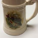 Vintage Porcelain Beer Stein with Fish.  Great detail in Fish picture on front.  Pre-owned & in excellent condition.  $20.00 obo