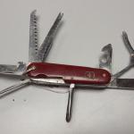 Vintage Swiss Army Knife.  Great piece.  Victoria Officer with 11 attachments.  Pre-owned & in excellent condition.  $75.00 obo