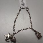 Sterling Silver Charm Bracelet with 2 Charms.  Cute item.  Measures 7".  Pre-owned & in excellent condition.  $47.00 obo