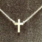 Sterling Silver Chain with Cross & Cubic Zirconia in Center.  Beautiful piece.  Measures 16" long.  Pre-owned & in excellent condition.  $16.00 obo