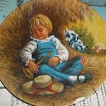 John McClelland - Collector Plate.  Plate 2 in Mother Goose Series:  Little Boy Blue 1980.  Comes with COA and Brochures.  This plate has a chip on the bottom of picture.  We are asking $8.00 obo