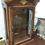 Vintage Wood Shelf Display Cabinet.  Made by Cornwell and has a great shell motif.  Measures 20"l x 8"w x 29.5"h.  Pre-owned & in great condition.  $85.00 obo