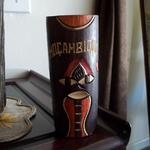 Mocambique Hand Carved/Painted Wood Vase.  Great carved detail.  Measures 6"h x 2.5" in diameter.  Pre-owned & in excellent condition.  $10.00 obo