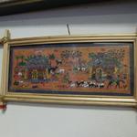 Small African Picture with Bamboo Frame.  Measures 11"l x 6"h.  Pre-owned & in excellent condition.  $15.00 obo