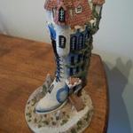 The Shoemakers Dream - The Crocked Boot.  Gorgeous Shoe House by Jon Herbert.  Limited edition with great detail.  Measure approximately 4.5" diameter x 9.5"h.  Pre-owned & in excellent condition.  $25.00 obo