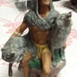 Ceramic Indian with Wolves.  Measures 5"w x 10"h.  Pre-owned & in excellent condition.  $39.00 obo