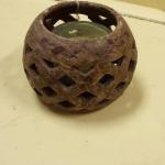 Thailand Ceramic Wholey Ball Candleholder.  Awesome when lit.  Pre-owned & in excellent condition.  $17.00 obo