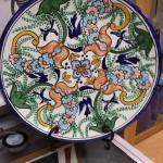 Round Ceramic Charger by D. Coydoro L.  Gorgeous piece.  Measures 15".  Pre-owned & in excellent condition.  $55.00 obo