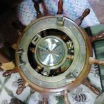 Ship's Clock in Ship's Wheel.  Great clock.  Measures 18" in diameter.  Pre-owned & in excellent condition.  $120.00 obo