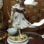 Vintage porcelain girl with goose figurine.  Gorgeous piece.  Pre-owned & in excellent condition.  $15.00 obo