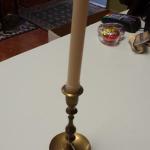 Shapely Brass Candlestick Holder.  Measures 3.5" x 7". Pre-owned & in excellent condition.  $15.00 obo