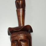 Hand Carved Wood Head with Hole Wall Hanger.  Very unique piece.  Measures 5.5" x 19"h.  Pre-owned & in excellent condition.  $20.00 obo