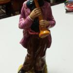 Vintage Hand Painted Horn Player Statute.  Beautifully painted.  Measures 12" high.  Pre-owned & in excellent condition.  $22.00 obo