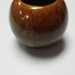 Small Ceramic Round Vase.  Beautifully painted and glazed green and brown.  Pre-owned & in excellent condition.  $16.00 obo