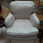 Vintage Pink Chair with Blue Trim on Wheels.  Has arm covers.  Pre-owned & in excellent condition.  We are asking $85.00 obo