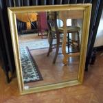 Large Gold Framed Mirror.  Gorgeous and was professionally framed.  Measures 25.5"l x 2"w x 32"h.  Pre-owned & in good condition  $55.00 obo