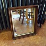 Small Brown Wood Mirror.  Beautiful and was professionally framed.  Measures 17"l x 1.5"w x 21"h.  Pre-owned & in excellent condition.  $48.00 obo