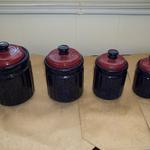 Set of 4 Blue & Maroon Kitchen Canisters.  Made in China tag on bottom.  Pre-owned & in excellent condition.  They measure 6", 5 1/2", 5", & 4" in height.  $16.00 for Set of 4 obo