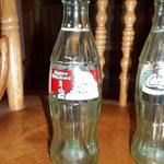 Coca Cola 1994 Limited Edition Happy Holidays Bottle - Lot of 2.  Each are 8 fl oz & empty.  Pre-owned & in great condition, no cracks or chips.  $2.00 each obo